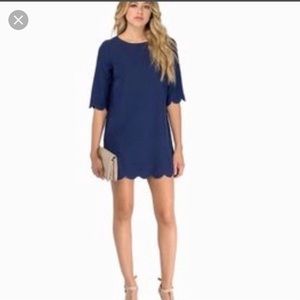Navy scalloped hem and sleeve dress